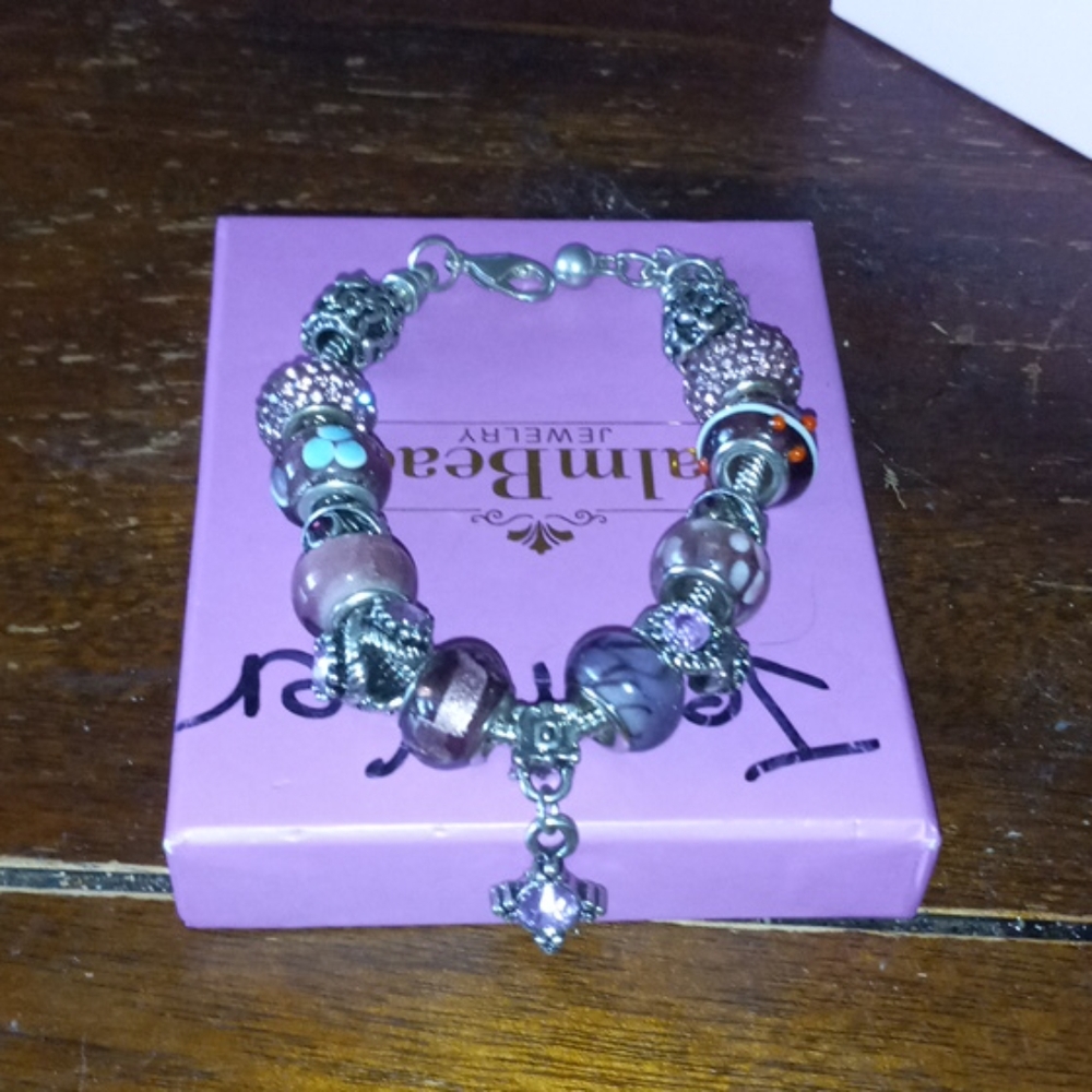 Palm beach  bracelet with charms on it